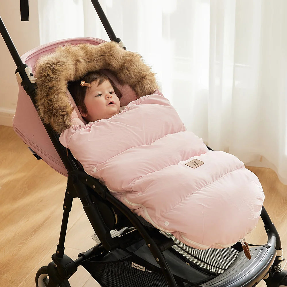 Baby Bubble winter sleeping bag for babies, warm pram footmuff with cozy lining, designed to keep infants comfortable during cold weather.