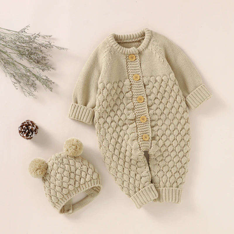 Baby Bubble knitted romper and cap set in cozy autumn/winter style, featuring soft knit fabric and cheerful design for infants.