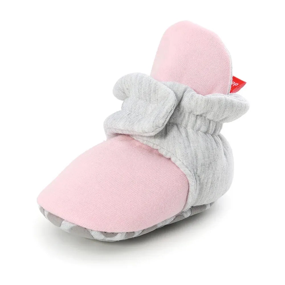 Baby Bubble soft anti-slip star booties for first walkers, featuring comfortable design and grip for early walking support.