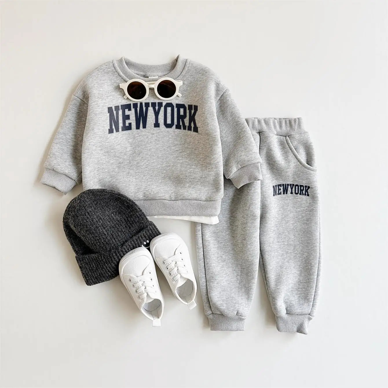 Baby Bubble winter outfit featuring a New York print top and matching pants, cozy and stylish for babies.