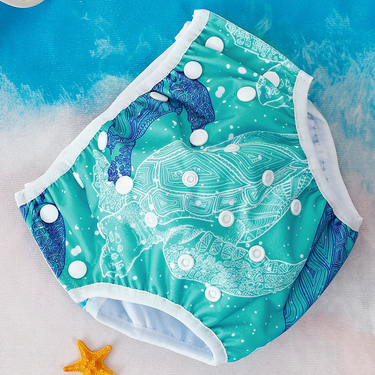 Reusable baby swim diapers with colorful animal print patterns by Baby Bubble, designed for comfortable water play.