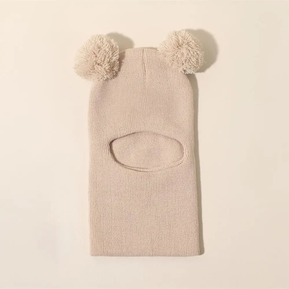Baby Bubble winter children's hooded knitted hat, cozy and warm, featuring a soft, colorful knit design for kids.