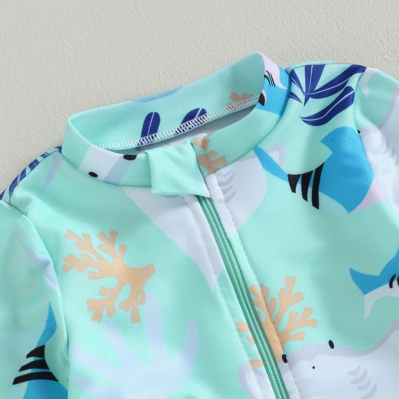 Girls long sleeve swimsuit with sea animal print by Baby Bubble, featuring colorful marine creatures on lightweight fabric.