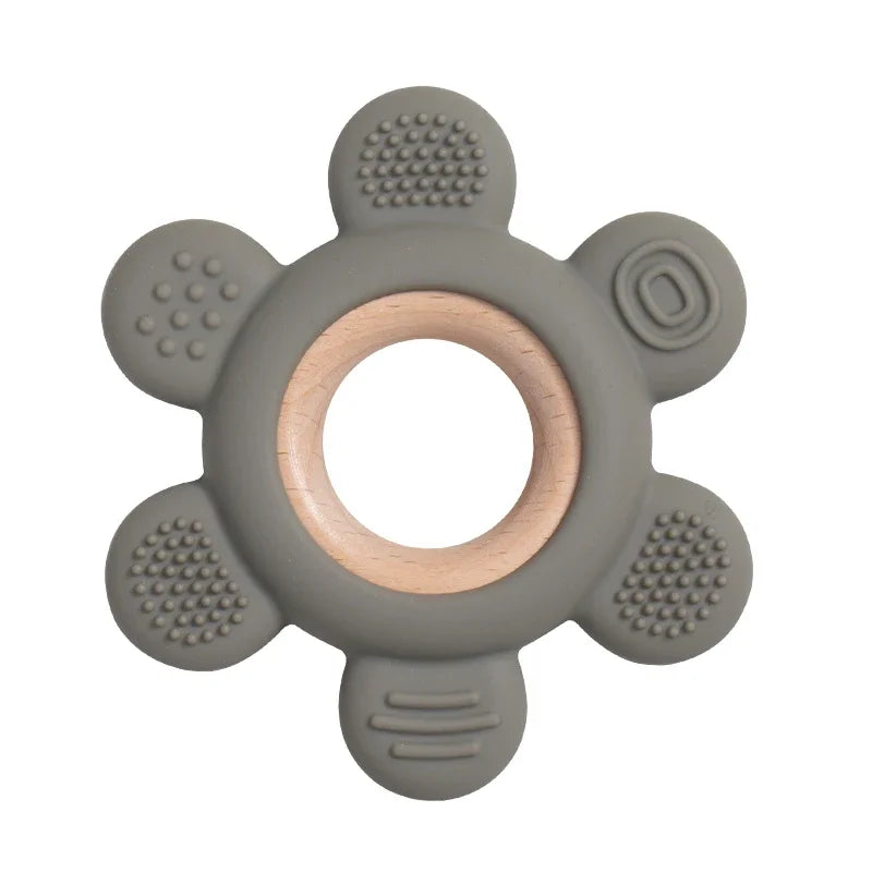 Baby Bubble silicone wood teether ring, a safe soothing chew toy for babies with natural wood and soft silicone textures.
