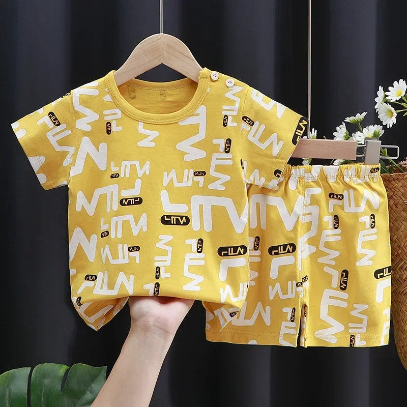 Baby Bubble cartoon print contrast T-shirt and shorts set, featuring colorful cartoon designs on a boy's casual outfit.