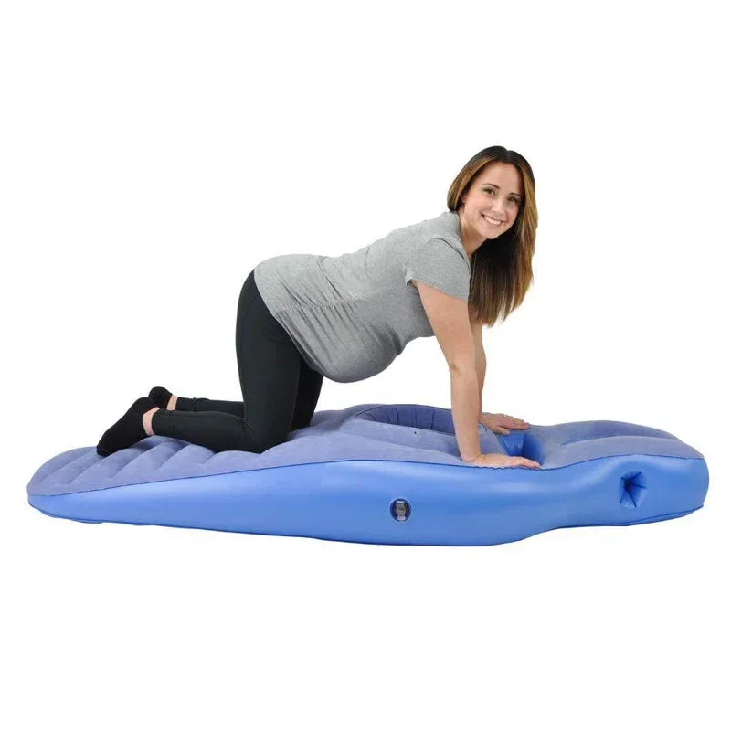 Inflatable pregnancy body pillow by Baby Bubble designed for restful side sleeping, shown inflated with supportive shape.