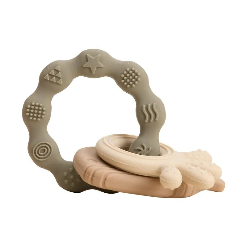 Baby Bubble BPA-free silicone baby teether glove with textured surface for gum relief, suitable for soothing sore gums during teething.