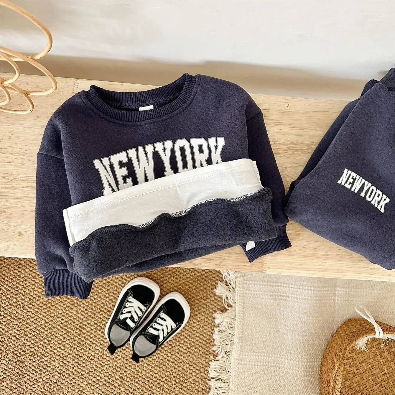 Baby Bubble baby winter outfit set with New York print top and pants, soft and cozy for cold weather, suitable for infants.