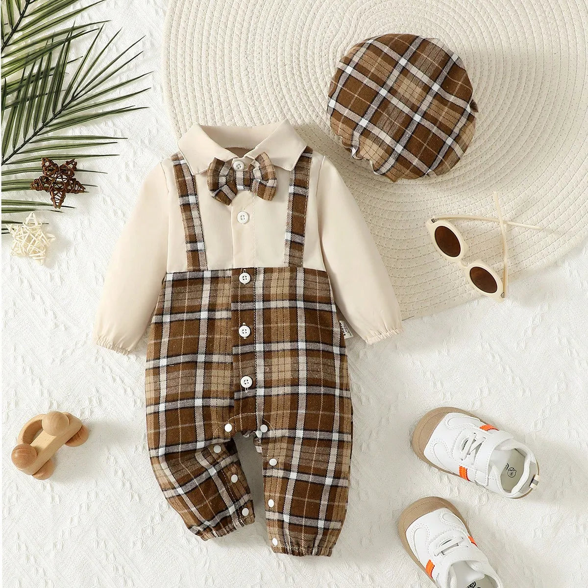 Baby Boy Gentleman Set featuring suspenders jumpsuit and hat, stylish baby clothing by Baby Bubble, shown on a baby.