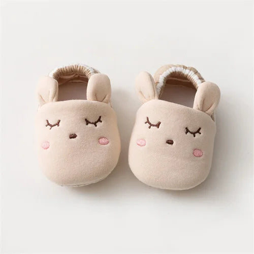 Baby Bubble first walker crib shoes with soft anti-slip soles, featuring a cute sneaker design for infants' early steps.