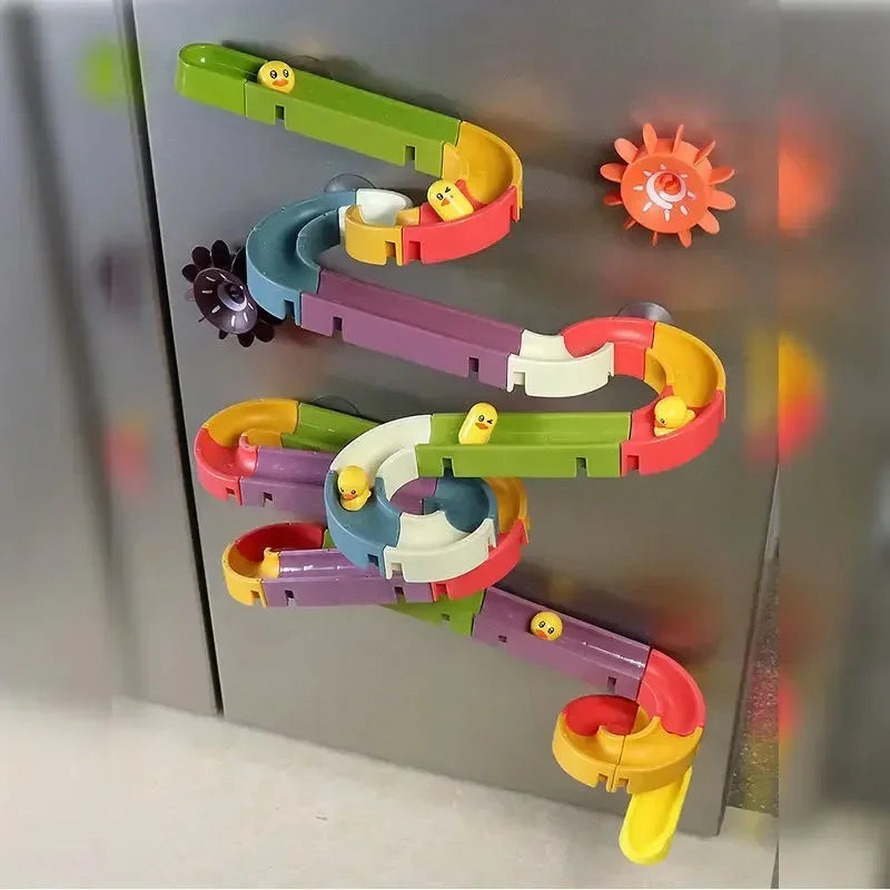 Baby Bubble DIY assembling track slide and duck water bath toy set with suction cups, designed for babies' bathtub play.