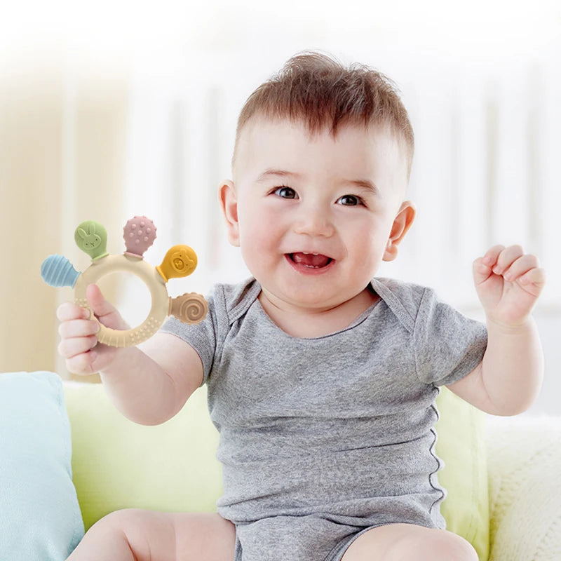 Colorful silicone baby ring teether by Baby Bubble, designed to soothe gums and promote teething comfort for infants.