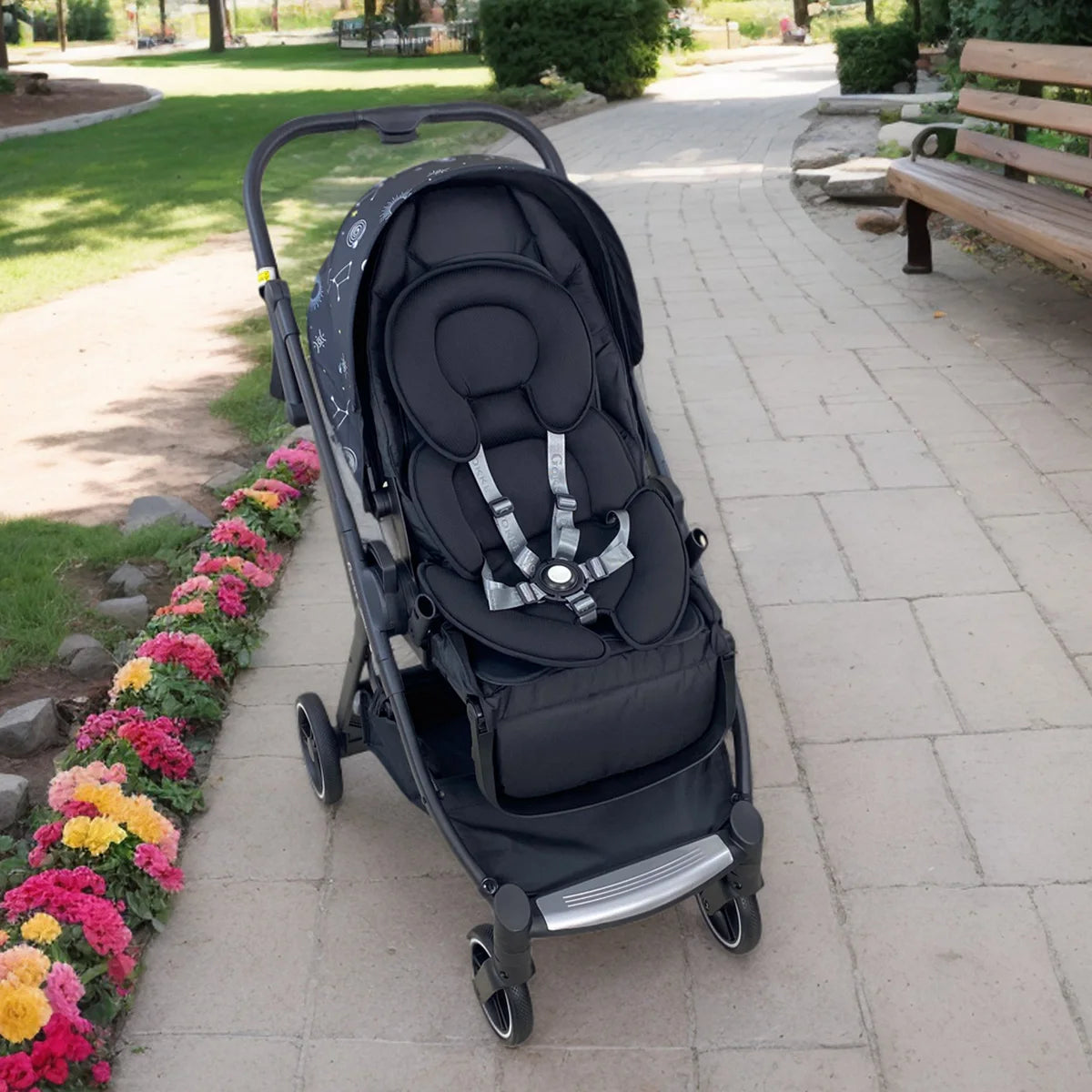 Baby Bubble newborn head support insert and body pillow for baby strollers, providing comfort and neck support.