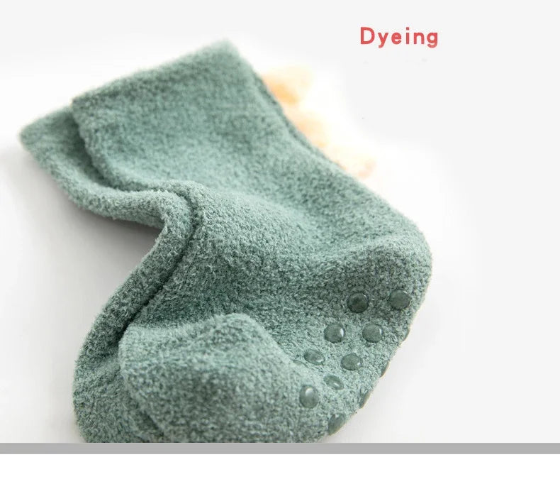 Baby Dinosaur socks by Baby Bubble featuring colorful, soft, and warm baby socks with playful dinosaur designs.