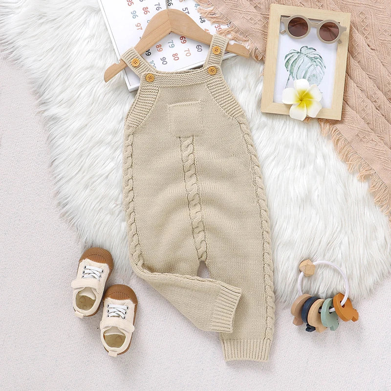 Baby Bubble sleeveless knitted romper displayed on a hanger, showcasing its soft, cozy all-season design for infants.