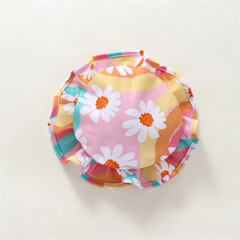 Baby Girl UV swimsuit with hat by Baby Bubble, long sleeve design with zipper, suitable for sun protection and swimming.