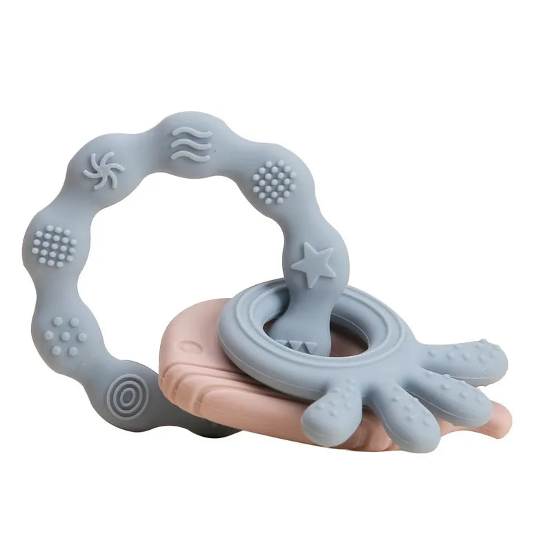 Baby Bubble BPA-free silicone baby teether glove with textured gum relief for soothing baby's gums, shown in the image.