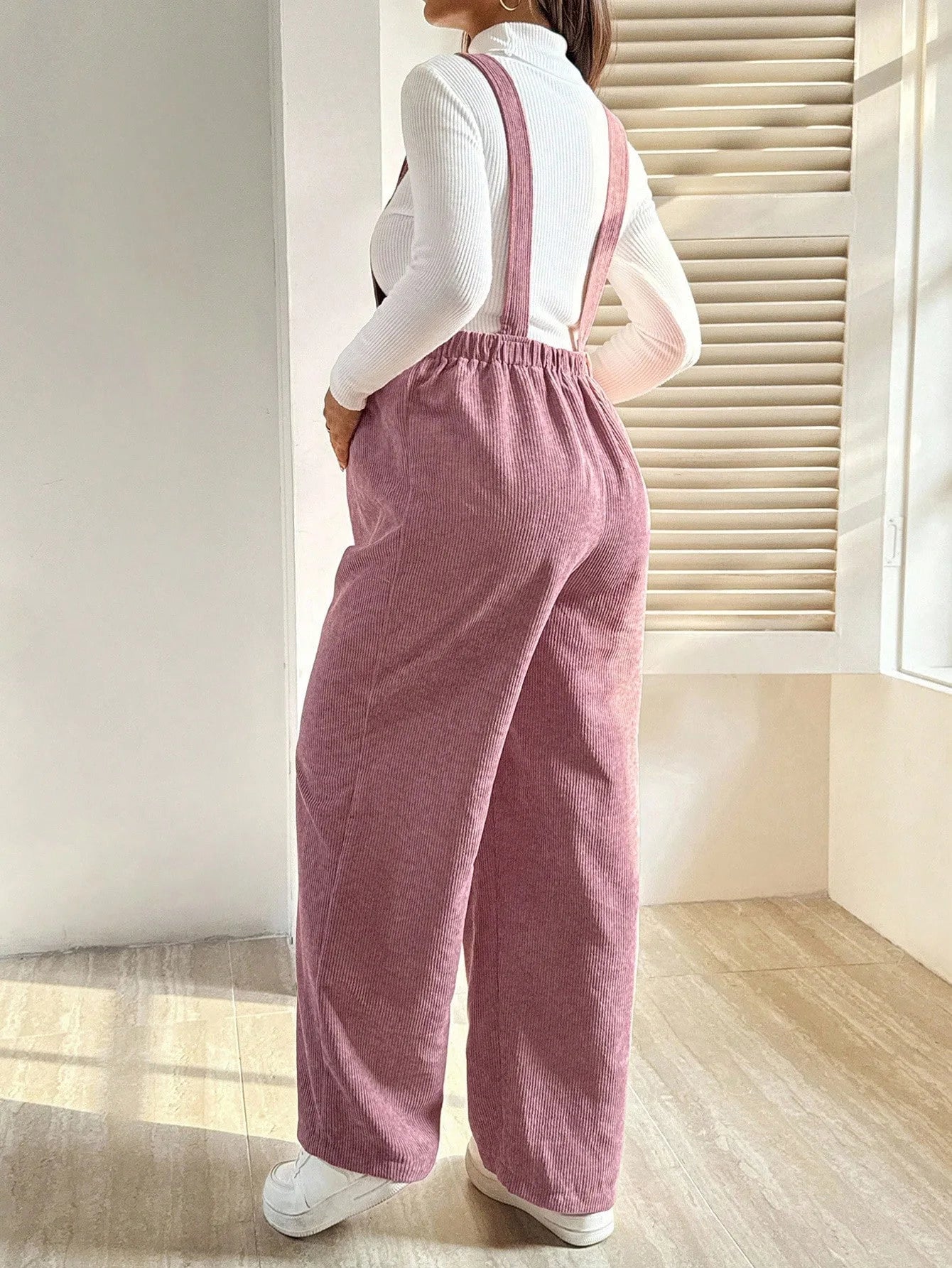 Baby Bubble maternity corduroy jumpsuit with suspenders, featuring a comfortable, stylish design for expecting mothers.