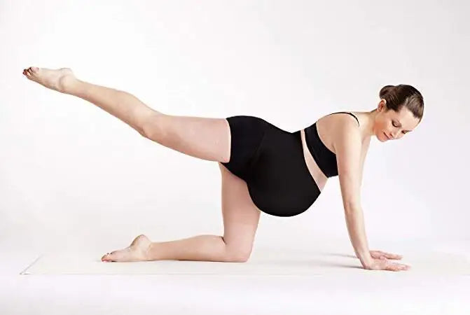 Breathable prenatal belly brace belt from Baby Bubble supporting pregnancies from 2 to 10 months, shown on a pregnant woman.
