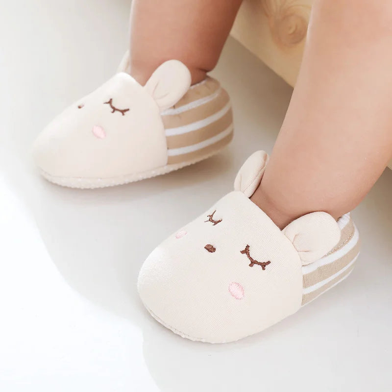 Baby Bubble first walker crib shoes with soft anti-slip soles, designed for infants learning to walk, shown in the image.