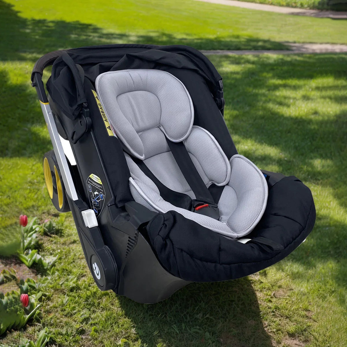 Baby Bubble newborn baby stroller head support insert with body pillow for added comfort and support during outings.