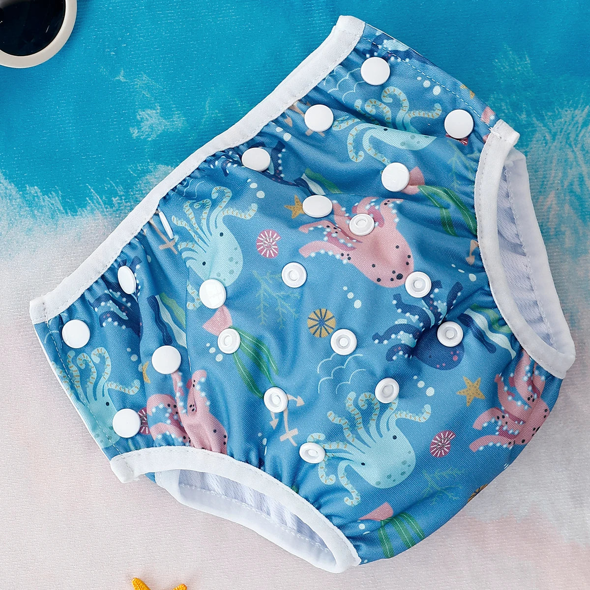 Baby Bubble washable swim diapers with adjustable fit, showing soft waterproof material and elastic waist for secure comfort.