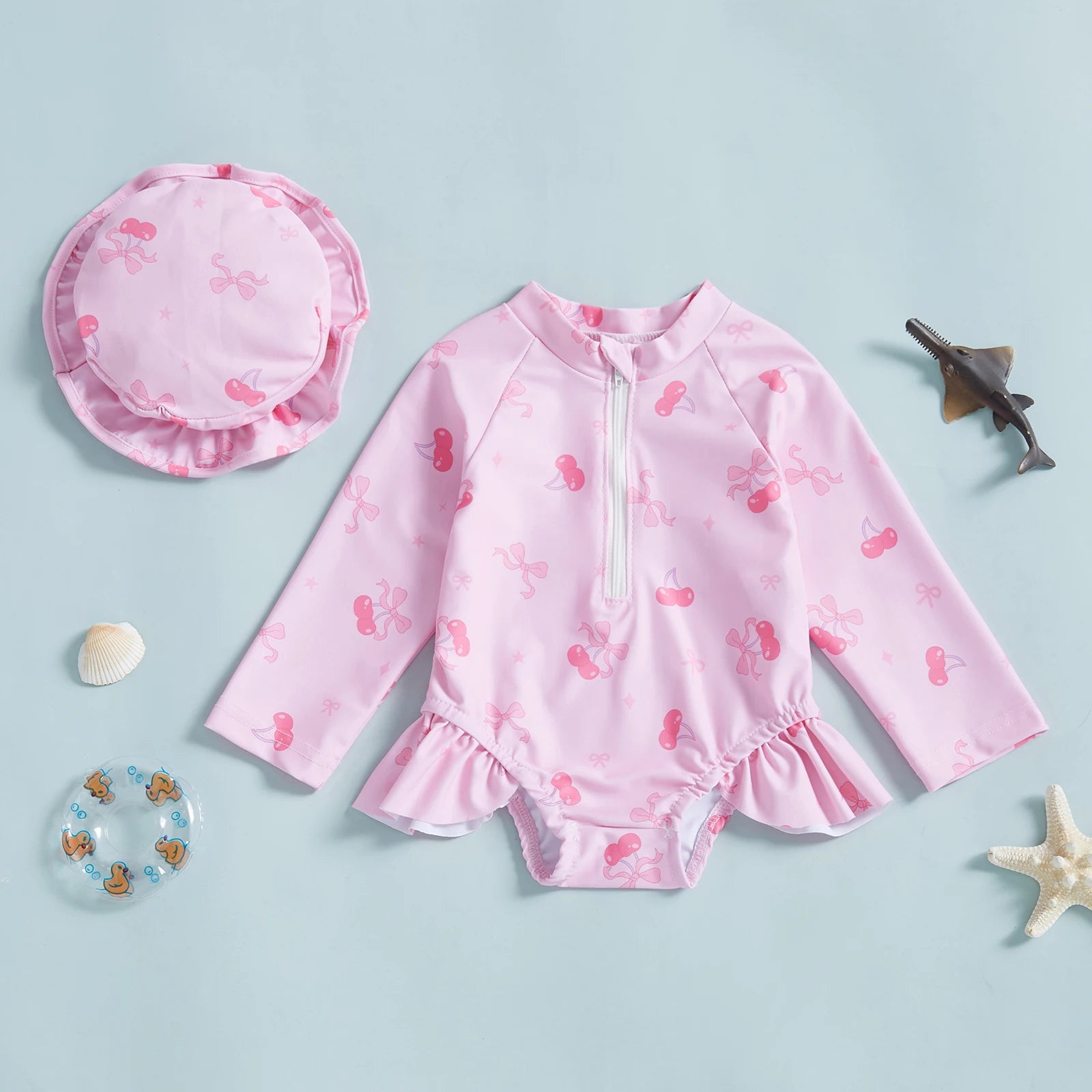Baby girls floral rash guard with hat, zip-up style from Baby Bubble, featuring colorful floral pattern and sun protection design.