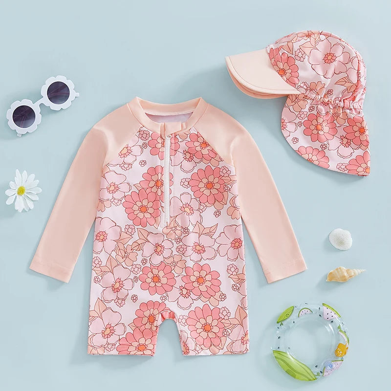 Baby Girl's floral and flamingo print rash guard set by Baby Bubble, featuring colorful sun protection swimwear for infants.