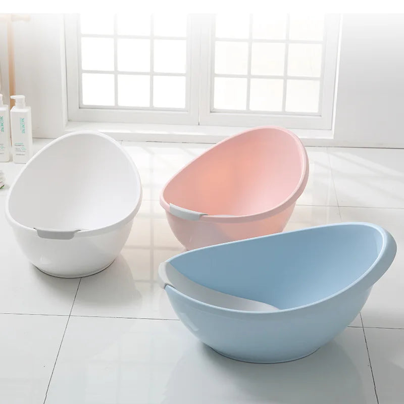 Egg-shaped Baby Bubble bathtub for newborns, featuring a safe, ergonomic design in soft pastel color for gentle bathing.