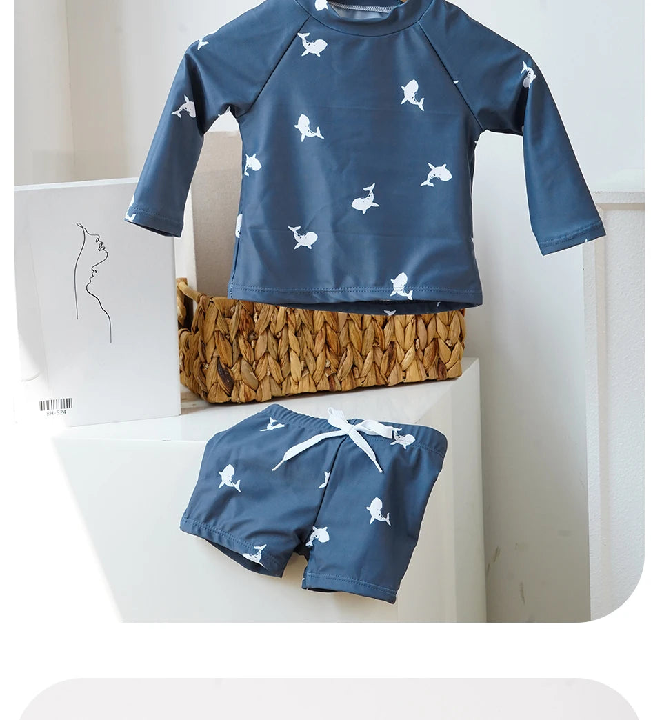 Baby boys' 2-piece swimsuit set by Baby Bubble with a cool print, featuring a sleeveless top and matching shorts for summer fun.