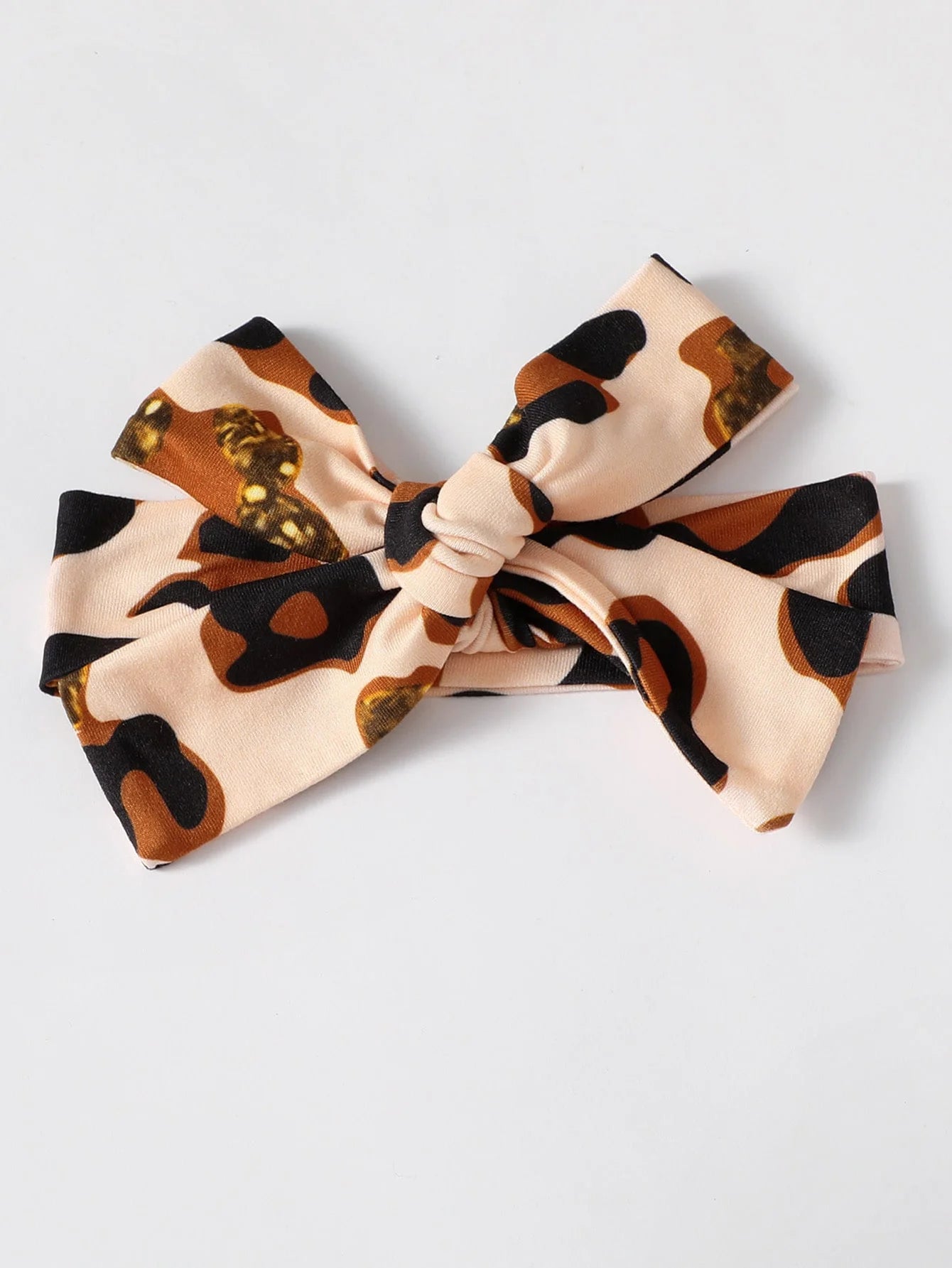 Baby girl leopard jumpsuit set by Baby Bubble with ruffle trim and matching headband, featuring a cute animal print and comfortable fit.