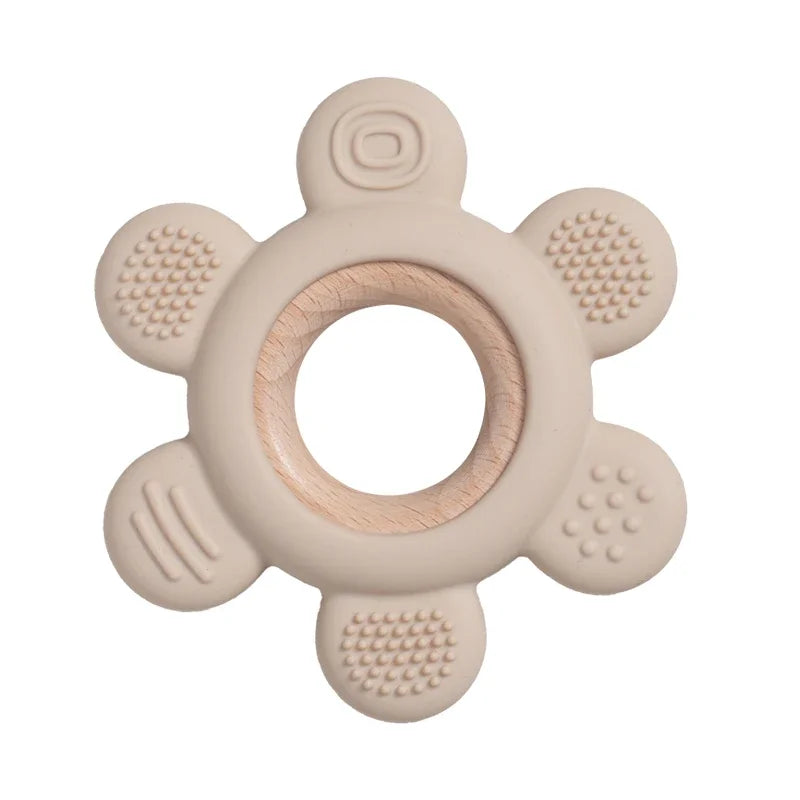 Baby Bubble silicone wood teether ring, a safe soothing chew toy for babies with colorful, textured silicone and wooden beads.