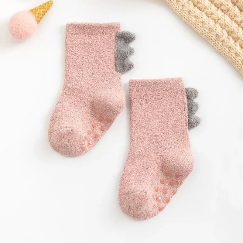 Baby Bubble baby dinosaur socks, soft and warm, featuring playful dinosaur designs, perfect for little feet.