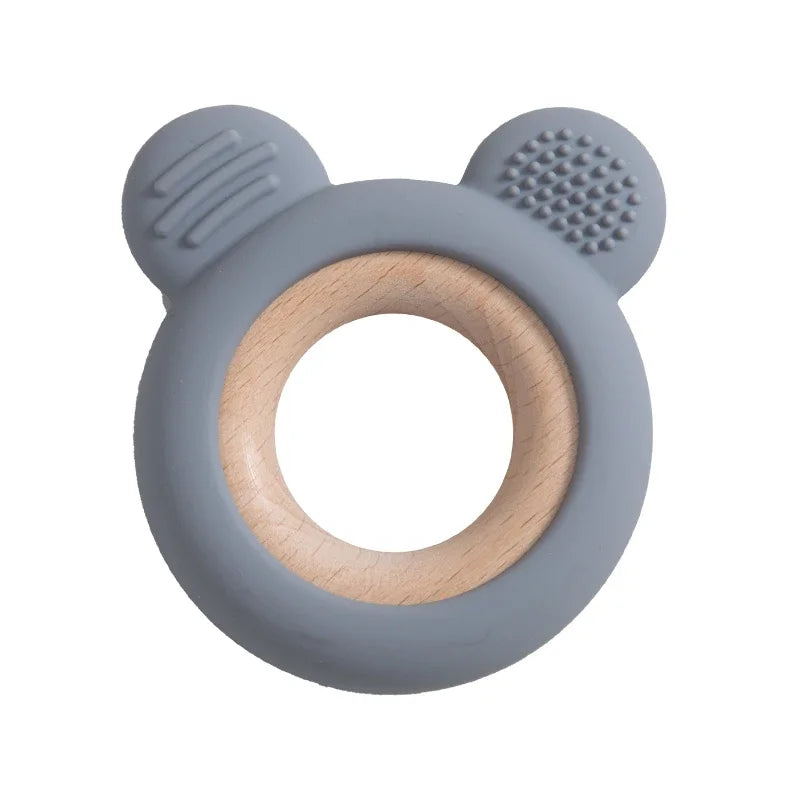 Baby Bubble silicone wood teether ring with smooth, natural wood and soft silicone for soothing baby chewing and teething relief.