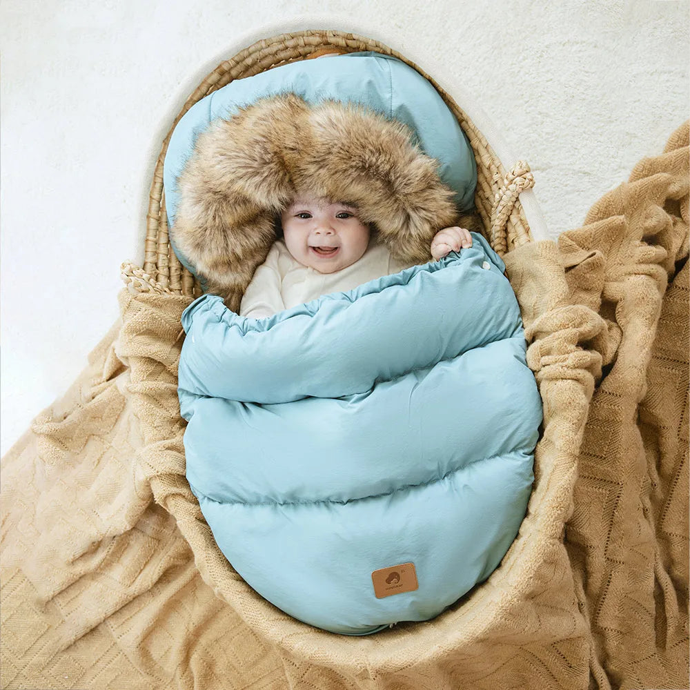 Baby Bubble winter pram sleeping bag with removable warm footmuff, soft insulated design for cozy baby outdoor comfort.