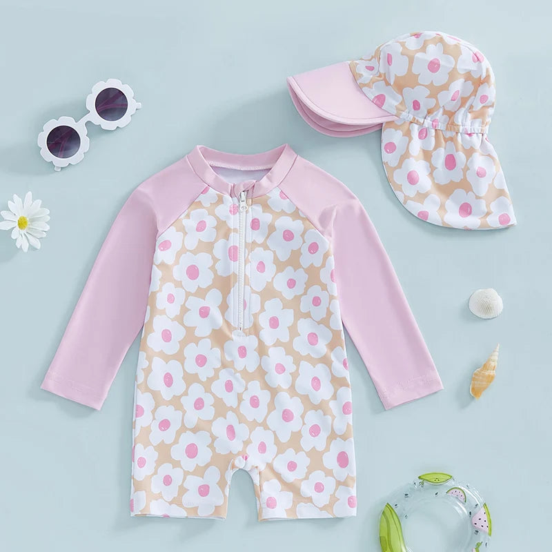 Baby girls' rash guard set by Baby Bubble featuring floral and flamingo print, with matching swimwear top and bottom.
