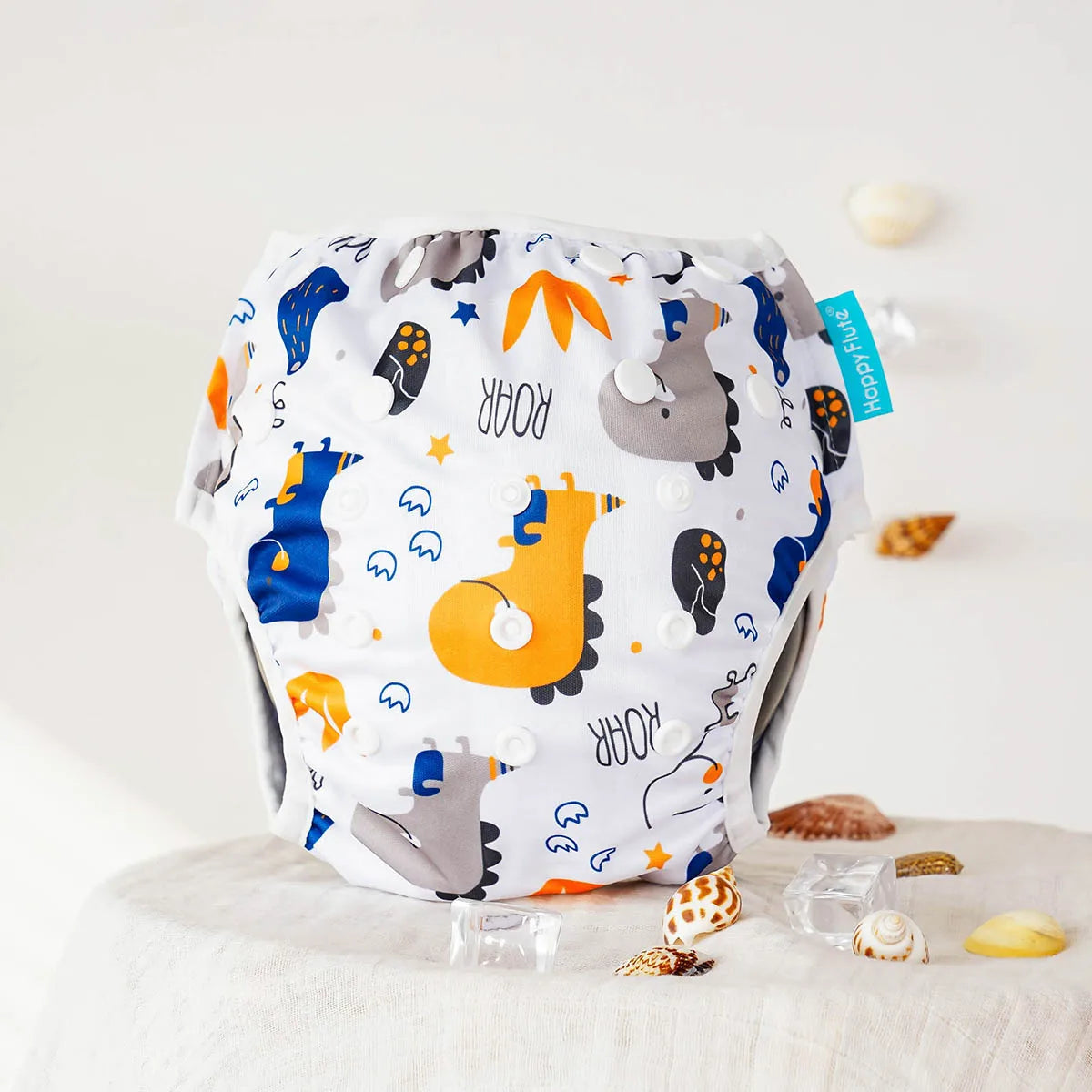 Baby Bubble reusable swim diapers with playful animal print design, ideal for infants during bath time or swimming.