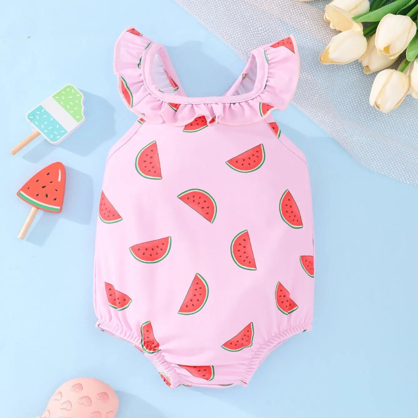 Baby Girl Watermelon Swimsuit by Baby Bubble, cute one-piece with watermelon print, suitable for infants and toddler swimming.