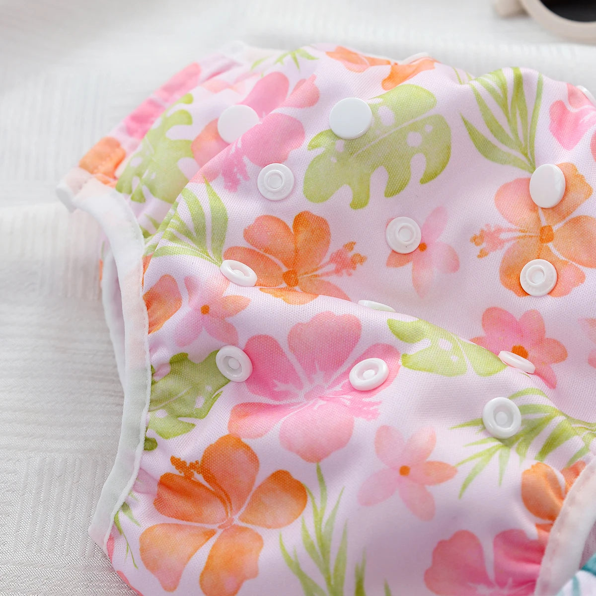 Baby Bubble washable baby swim diapers with adjustable fit, shown in blue, designed for comfortable water play.