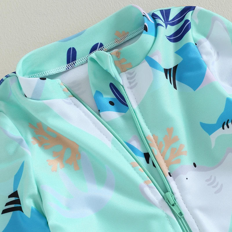 Girls long sleeve swimsuit with sea animal print by Baby Bubble, featuring colorful marine creatures on a bright background.