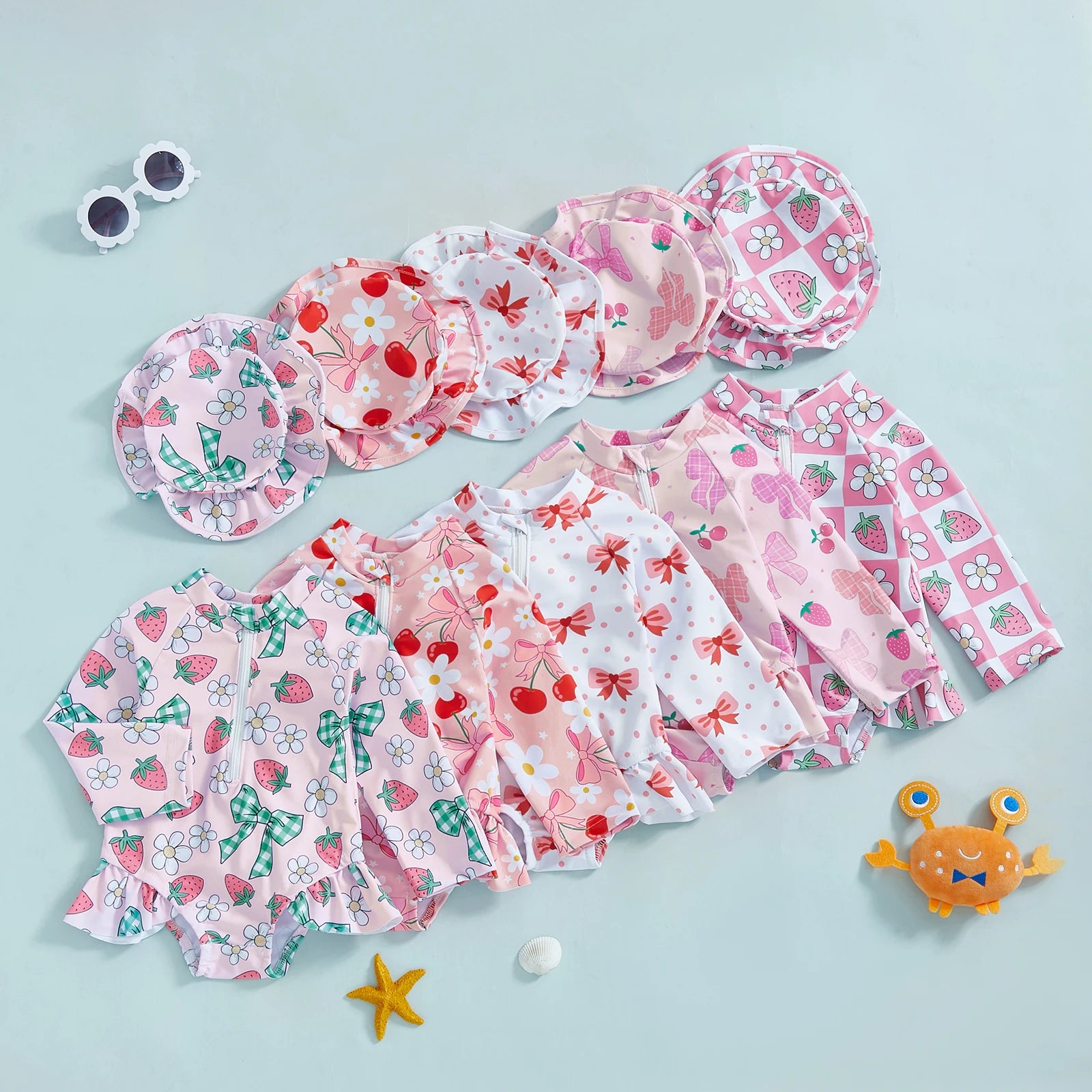 Baby girls floral rash guard with hat from Baby Bubble, zip-up swimsuit with colorful floral pattern and sun protection hat.