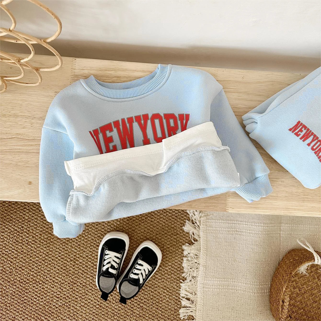 Baby Bubble winter outfit featuring a New York print top and matching pants in a cozy 2-piece set for infants.