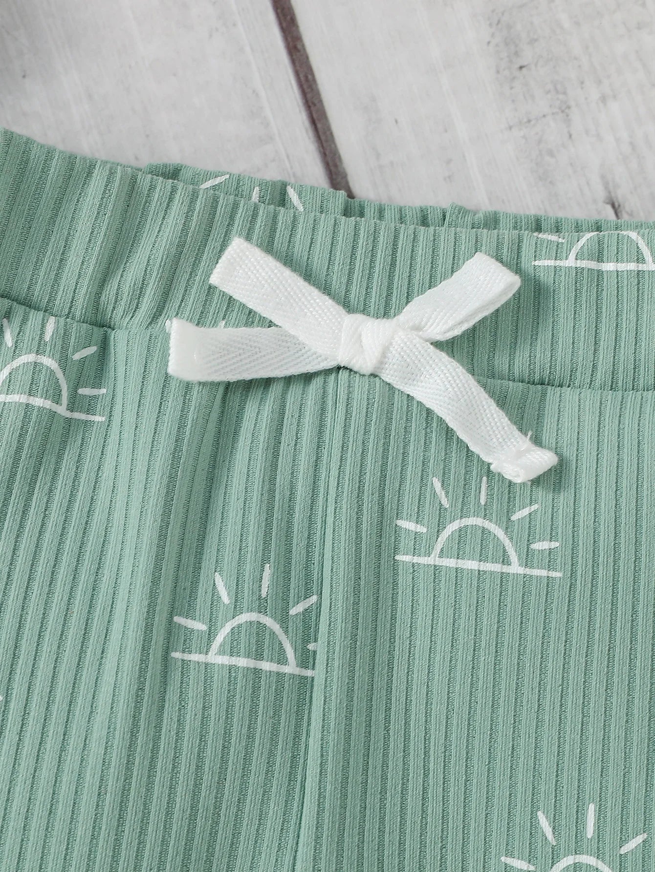 Baby boy 2-piece outfit by Baby Bubble featuring a cute jumpsuit and pants, perfect for comfortable and stylish baby wear.