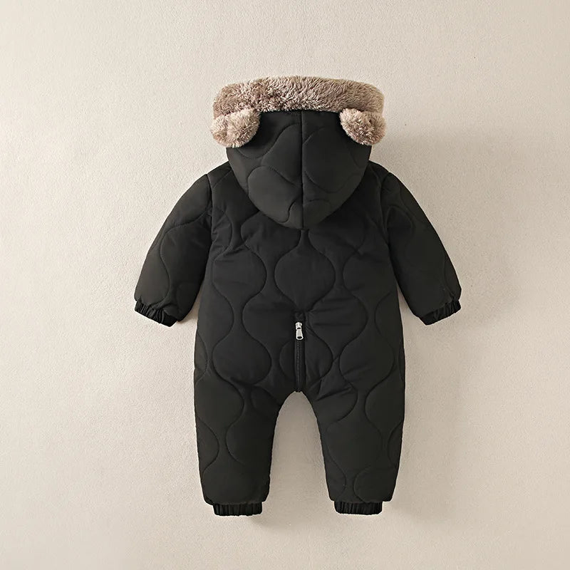 Baby Bubble winter jumpsuit with fur lining and cartoon print, designed for warmth and comfort for babies.