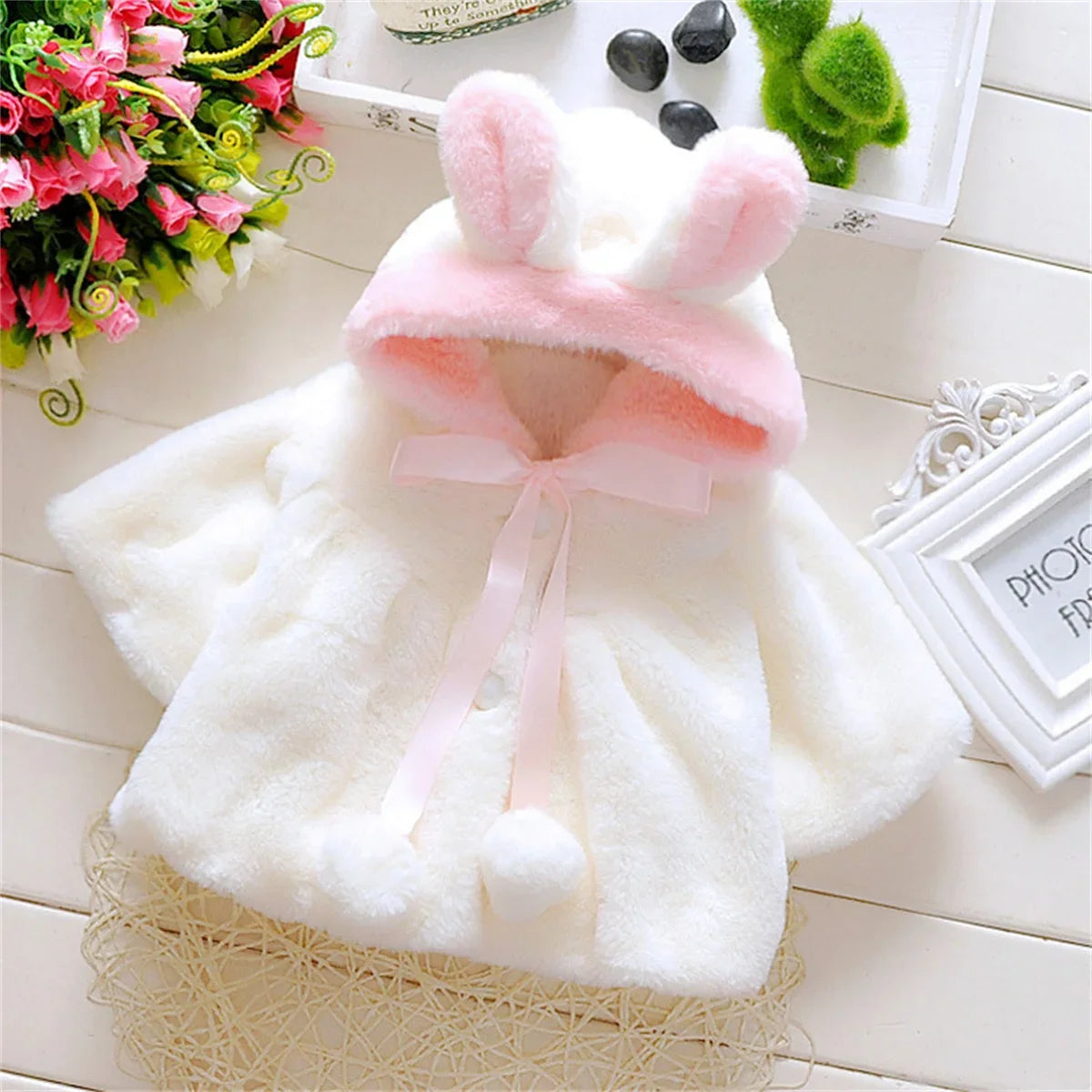 Girls wool cape by Baby Bubble featuring a cozy winter design and stylish look, perfect for staying warm and fashionable.