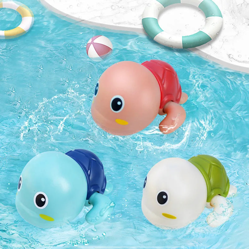 Cute baby bath toys including a swimming turtle and duck, perfect for toddler bath time and pool play by Baby Bubble.