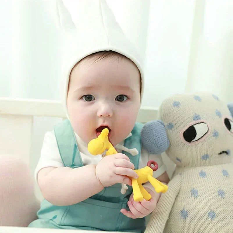 Baby Bubble silicone giraffe teether with textured surface for soothing sore gums, designed for infants to chew comfortably.