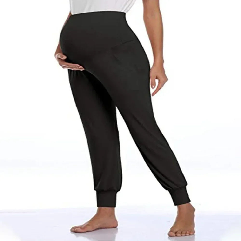 Soft high waist maternity jogger pants from Baby Bubble, featuring comfortable stretch fabric and relaxed fit for expecting mothers.