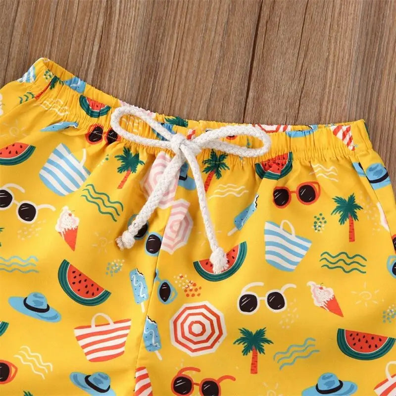 Kids swim shorts by Baby Bubble with quick-dry fabric and UV protection, featuring colorful patterns suitable for boys and girls.