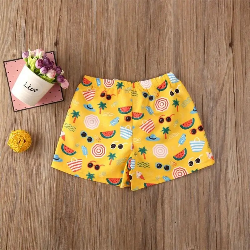 Kids swim shorts from Baby Bubble featuring quick-dry fabric and UV protection, shown in vibrant colors suitable for swimming and beach activities.
